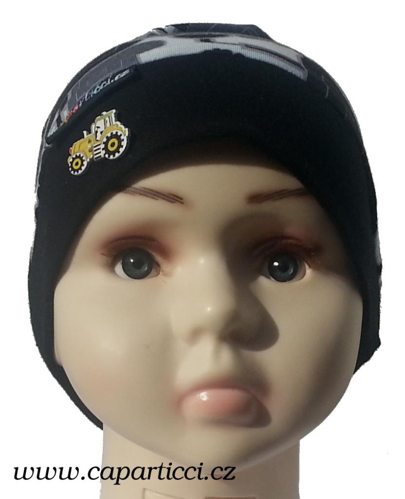 traktor se žlutým knoflíkem traktora